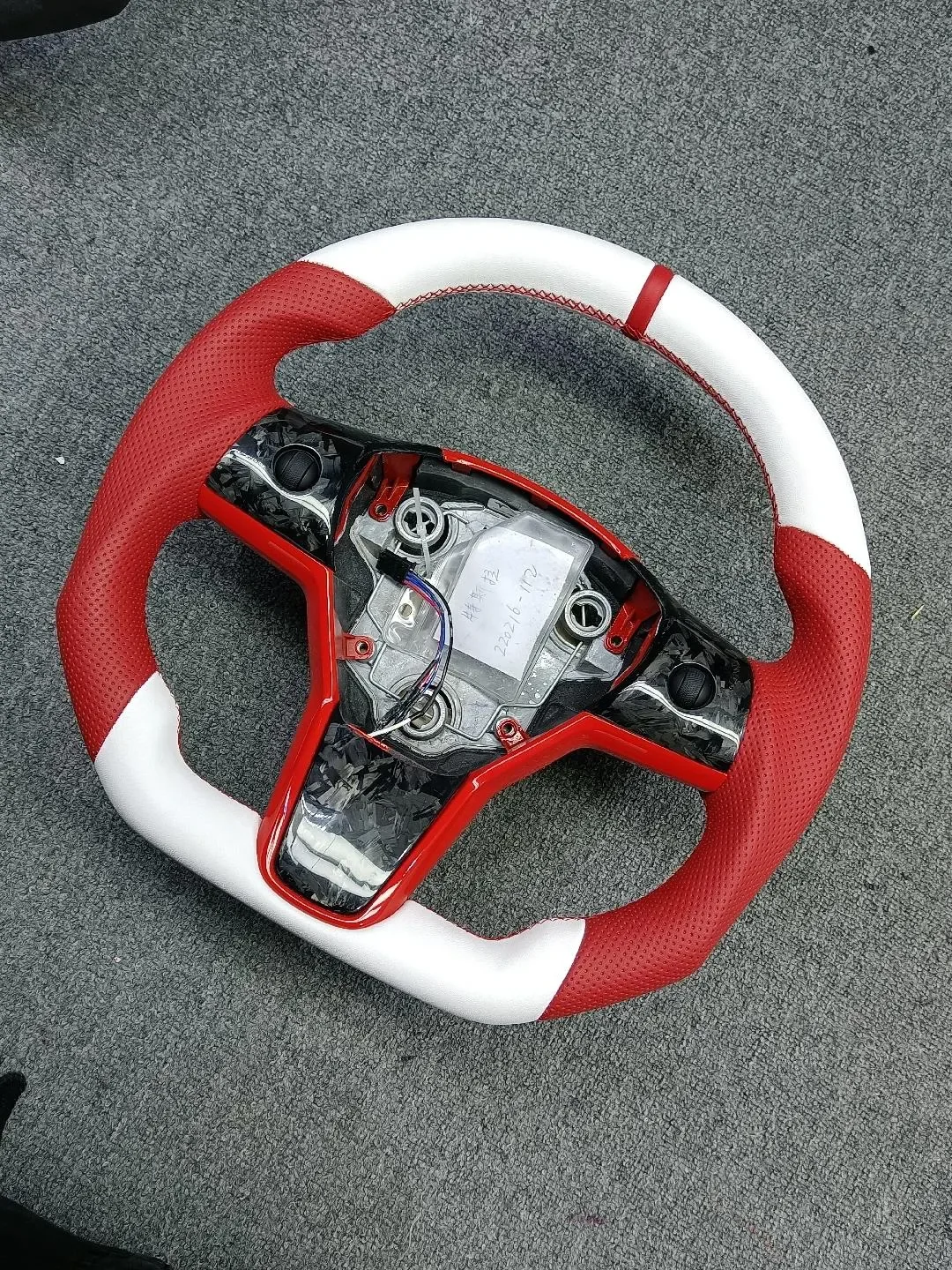 tesla carbon fiber steering wheel