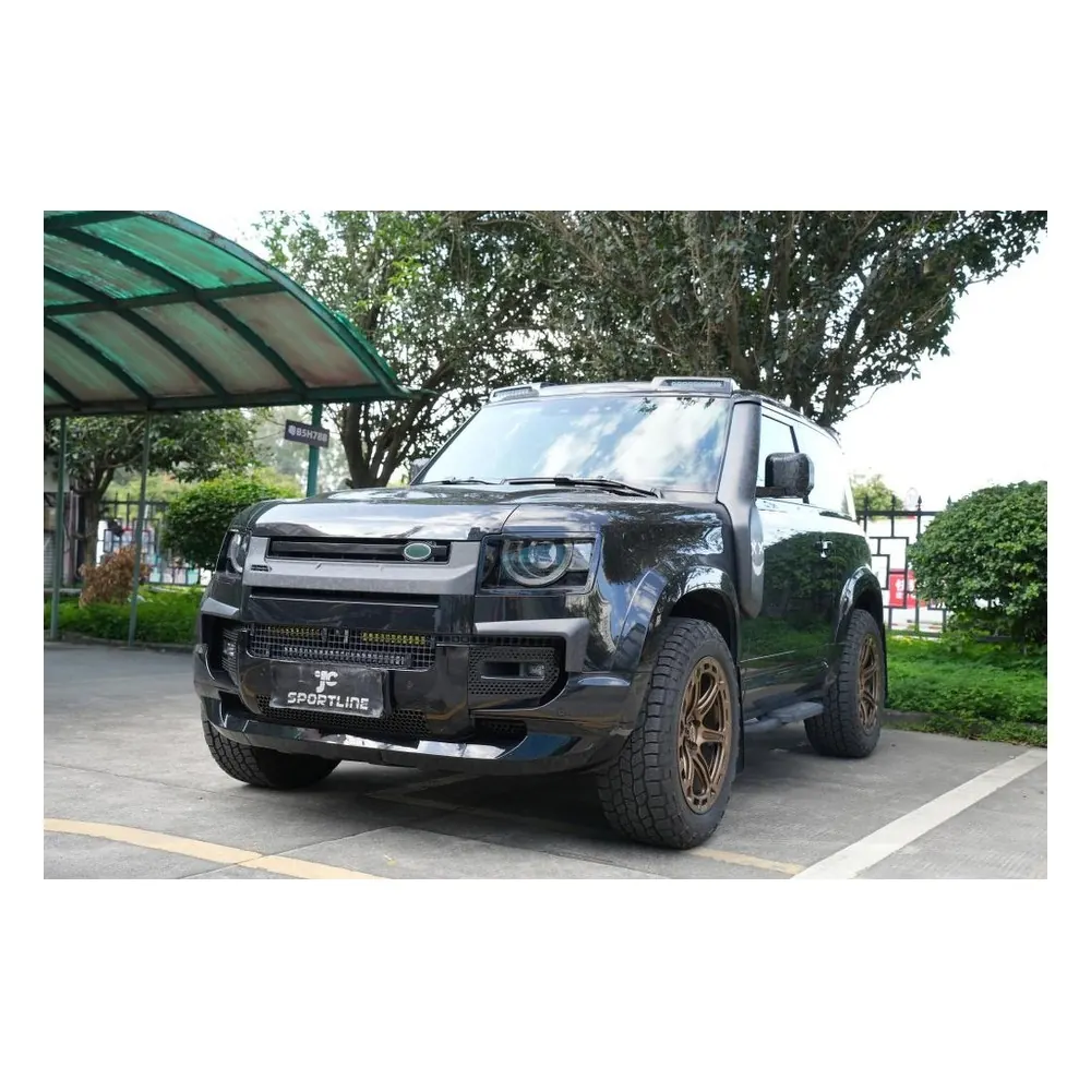 Carbon Fiber Front Grille Cover Trim for Land Rover Defender Sport Utility 4-Door (2020-2023) — close-up of the woven texture