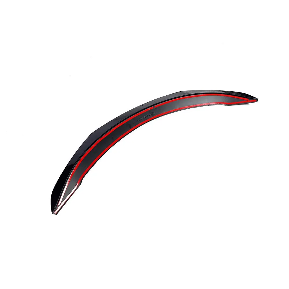 Carbon fiber boot lip spoiler for a Tesla Model 3